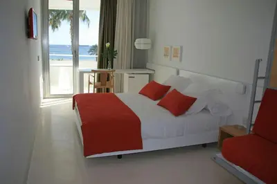 Cama o camas de una habitación en Hotel Las Palmas