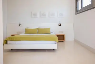 Cama o camas de una habitación en Hotel Las Palmas