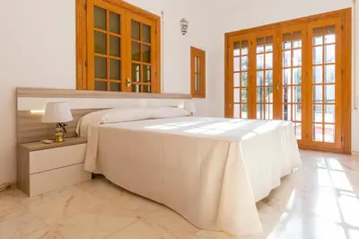Cama o camas de una habitación en Casa Atalaya en Villa de Nijar con piscina