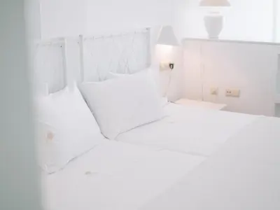 Cama o camas de una habitación en Hostal del Cabo