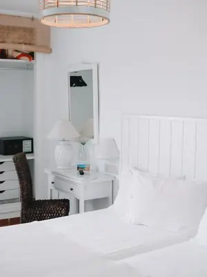 Cama o camas de una habitación en Hostal del Cabo