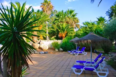 Jardín al aire libre en Apartamentos Moguima