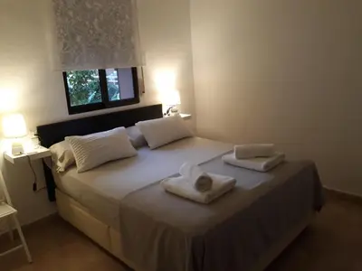 Cama o camas de una habitación en Miramar Habitaciones