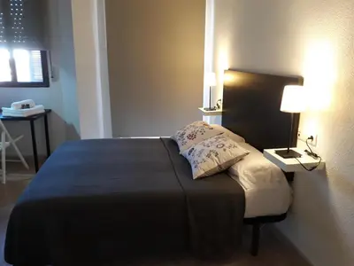 Cama o camas de una habitación en Miramar Habitaciones