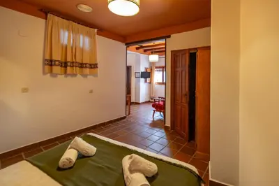 Cama o camas de una habitación en Hotel La Fragua I