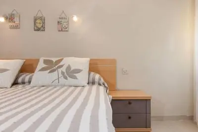 Cama o camas de una habitación en Roquetas Beach