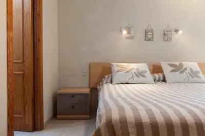 Cama o camas de una habitación en Roquetas Beach