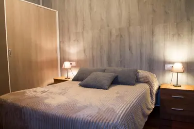 Cama o camas de una habitación en Vivienda Rural Alba