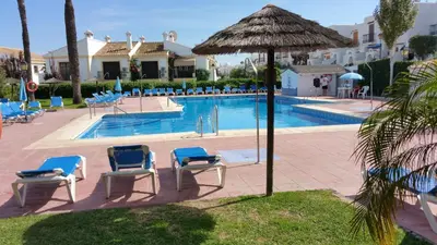 Piscina en o cerca de Apartamento Primera Linea de Playa Las Marinas