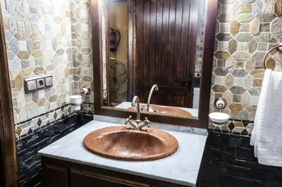 Un baño de Alojamientos Rurales Benarum con Spa