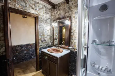 Un baño de Alojamientos Rurales Benarum con Spa