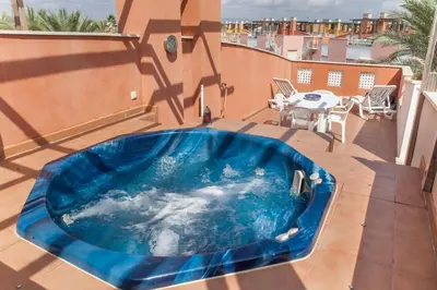 Piscina en o cerca de Atico Vera