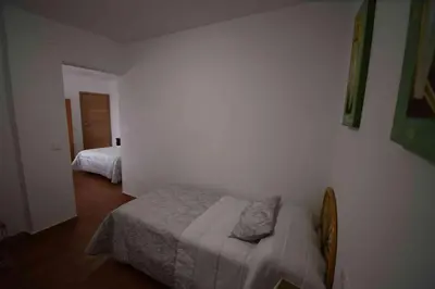 Cama o camas de una habitación en Apartamentos Horno y Casa De Dulce