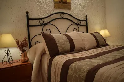 Cama o camas de una habitación en Apartamentos Horno y Casa De Dulce