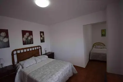 Cama o camas de una habitación en Apartamentos Horno y Casa De Dulce