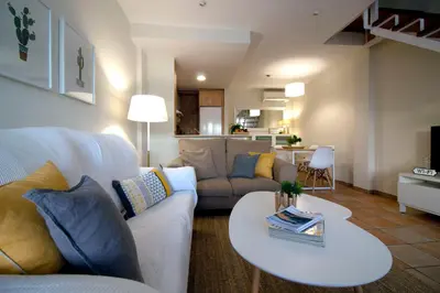 Zona de estar de Apartamento El Cabo l