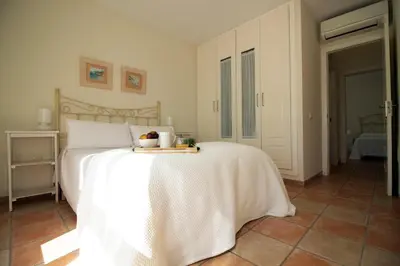 Cama o camas de una habitación en Apartamento El Cabo l