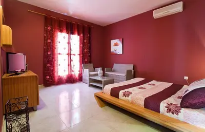 Cama o camas de una habitación en Hotel Atalaya