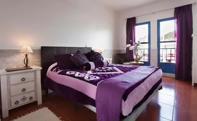 Cama o camas de una habitación en Hotel Atalaya
