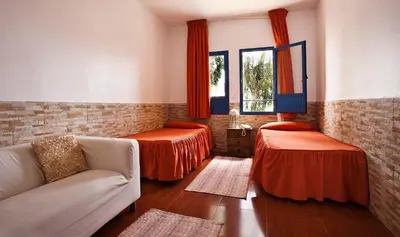 Cama o camas de una habitación en Hotel Atalaya
