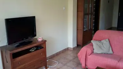 Una televisión o centro de entretenimiento en Villa Alandalus
