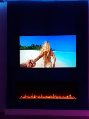 Una televisión o centro de entretenimiento en Apartamento SOLYMAR 3
