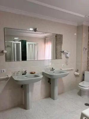 Un baño de Hostal Las Dunas