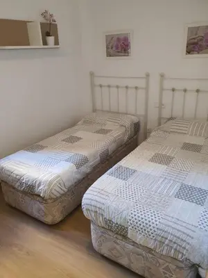 Cama o camas de una habitación en Primera línea playa
