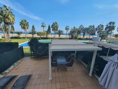 Piscina en o cerca de Primera línea playa