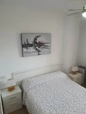 Cama o camas de una habitación en Primera línea playa