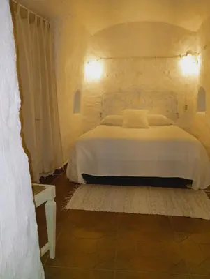 Cama o camas de una habitación en Cueva Alfano