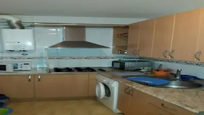 Una cocina o zona de cocina en Sol todo el año en Roquetas de Mar