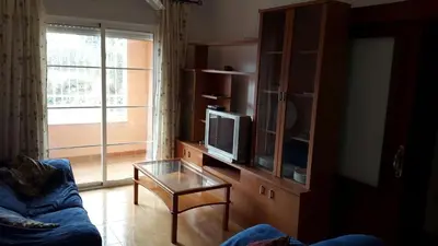 Una televisión o centro de entretenimiento en Sol todo el año en Roquetas de Mar