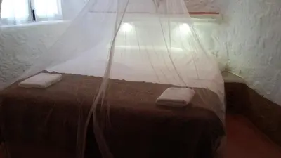 Cama o camas de una habitación en Cueva Las Yeseras