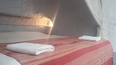 Cama o camas de una habitación en Cueva Las Yeseras