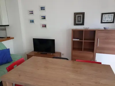 Una televisión o centro de entretenimiento en Primerísima línea de playa