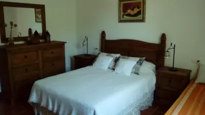 Cama o camas de una habitación en El Cerrillo