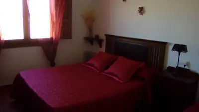 Cama o camas de una habitación en El Cerrillo