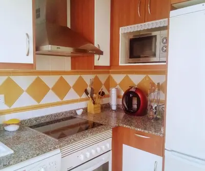 Una cocina o zona de cocina en Home Star Ii