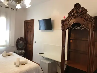 Una televisión o centro de entretenimiento en Casa Pedro