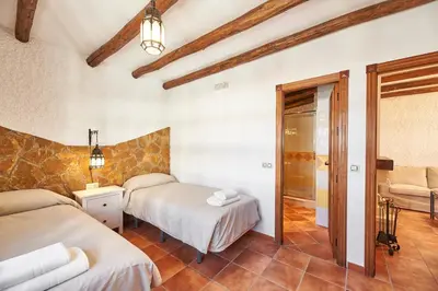 Cama o camas de una habitación en La Almunia de la Alpujarra