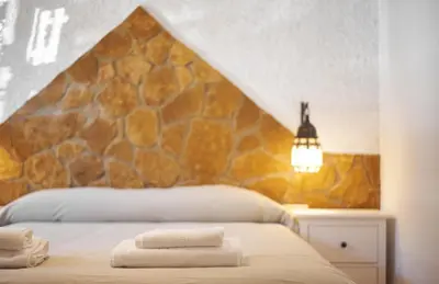 Cama o camas de una habitación en La Almunia de la Alpujarra