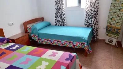 Cama o camas de una habitación en Apartamento Roquetas playa con WIFI