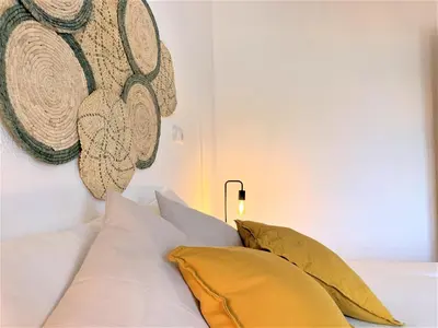 Cama o camas de una habitación en Eonia Marinas-Dúplex con porche en primera línea!
