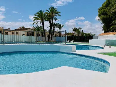 Piscina en o cerca de Eonia Marinas-Dúplex con porche en primera línea!