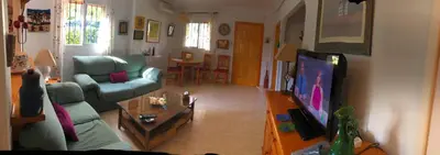 Una televisión o centro de entretenimiento en Duplex Vera - Playa
