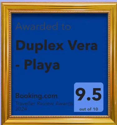 Certificado, premio, señal o documento que está expuesto en Duplex Vera - Playa