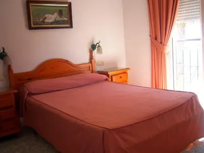 Cama o camas de una habitación en Pensión Felipe