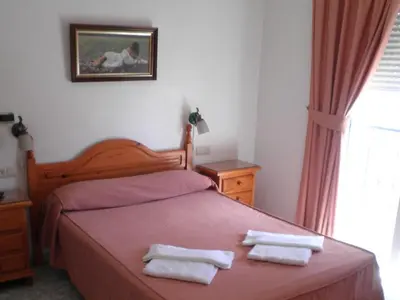 Cama o camas de una habitación en Pensión Felipe