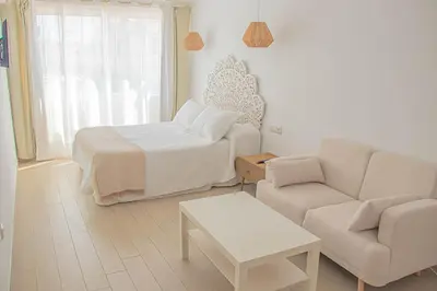 Cama o camas de una habitación en H Rincón de Diego